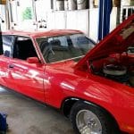 Red car being repaired - Mechanic in Gympie, QLD